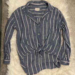 Blue and white striped buttoned shirt with front knot